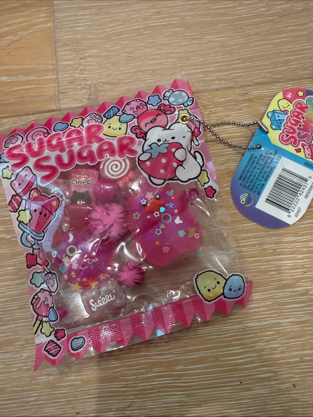Sugar Swaps Pink Gacha Pouch by Orb Toys, with a collectible trinket bag